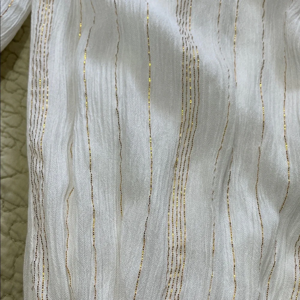 Bell sleeve ruffle top and matching gold striped high low skirt